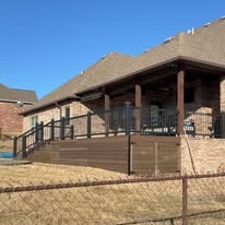Wooden deck built by Stronghold Fencing and Construction